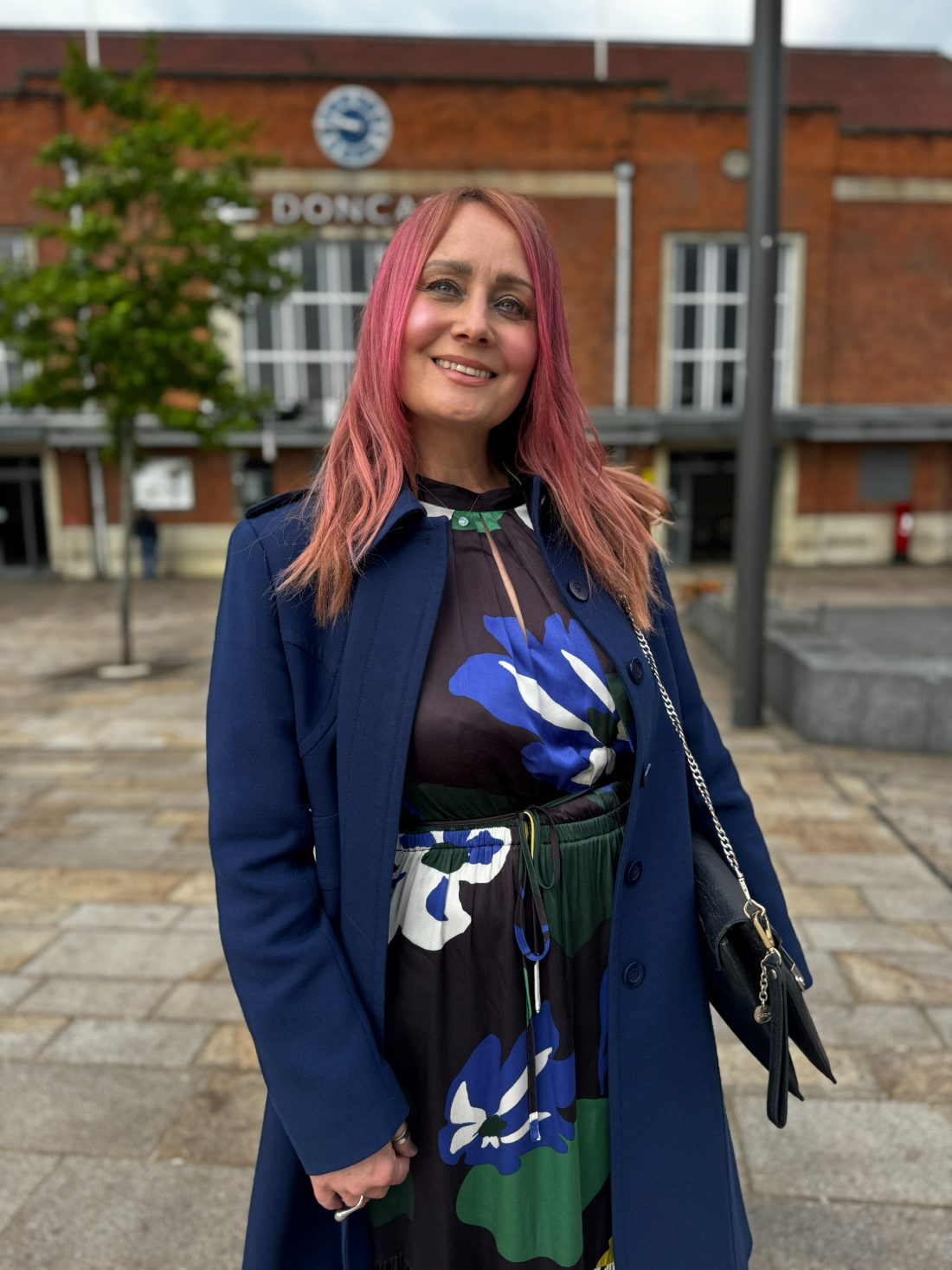 Estelle Pearce outside Doncaster station on the day of the Royal Garden Party